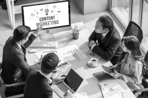 content marketing for lawyers. Attorneys sitting around a table discussing